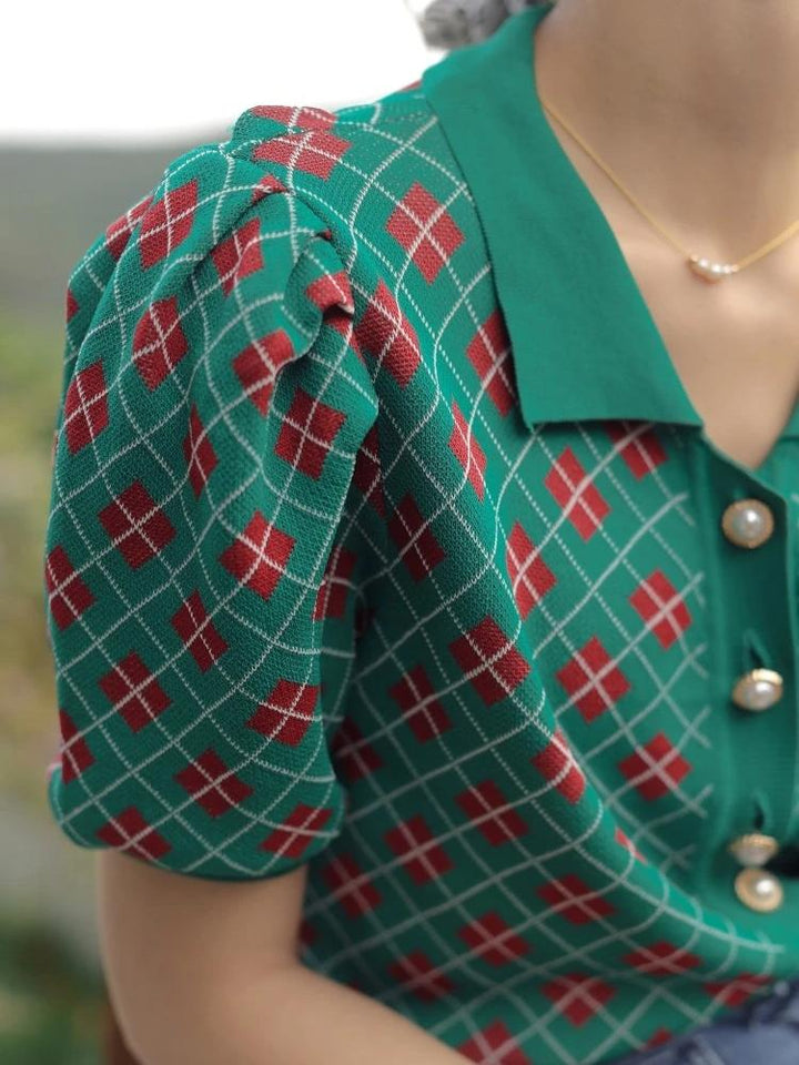 This delicate red, green and white button-down argyle blouse is just right for every and any occasion this season. Plunging into a high v neck adorned with sweet pearl buttons to give it that cozy vintage feel. Wear it with jeans/pants or a skirt. Its short slightly puffy sleeves give this shirt a bit of a play, wear it alone or with a fluffy overcoat. Made with fine yarn cotton every detail hand measured.