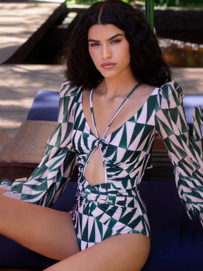 Luxury collection Geo pink and green triangle geo shaped pattern swimsuit. Made from top durable material, that will last! Hallowed out with long "airy" sleeves for top sun protection. High waist and v necktie. If you're going for a high class, prestigious look, this monokini is just for you.